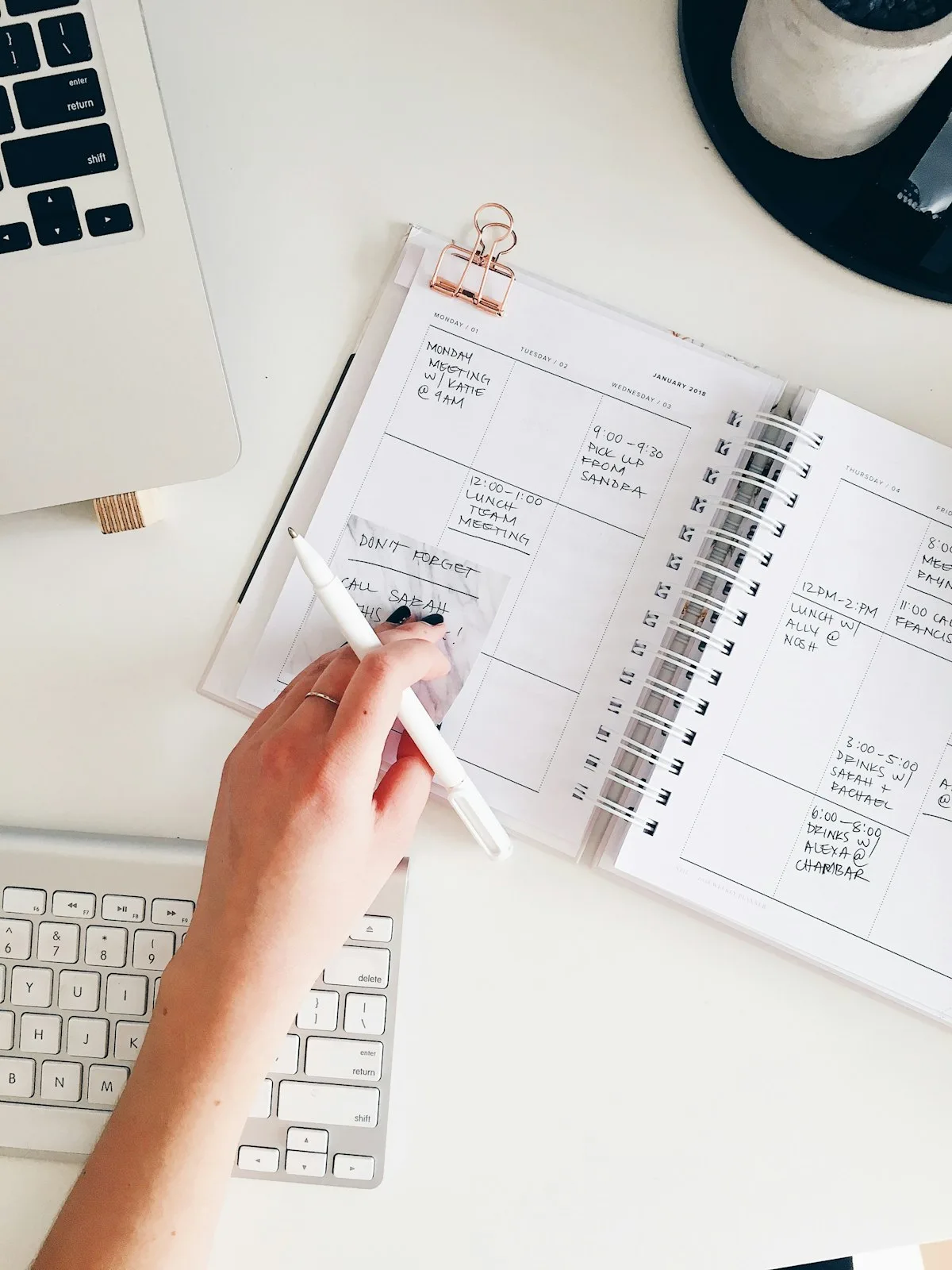 Content planning with notepad and marketing materials